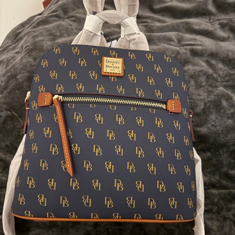 Dooney & Bourke Blue and Brown Backpack with Monogram Pattern